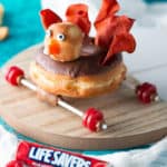 Thanksgiving Treats using chocolate turkey donut on a car frame with Life Savers tires