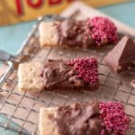 graham crackers covered in melted Toblerone chocolate topped with sprinkles