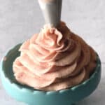strawberry whipped cream on a small plate