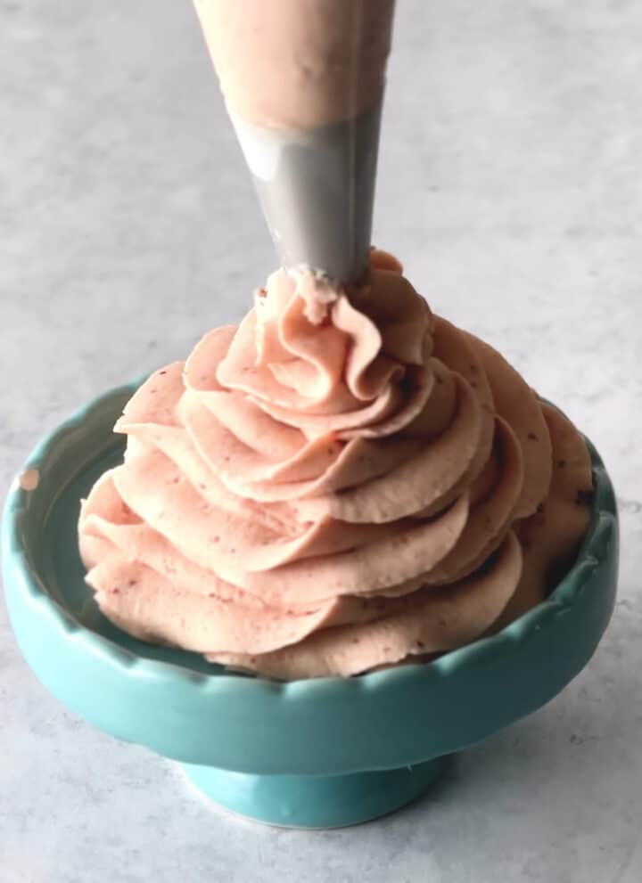 strawberry whipped cream on a small plate